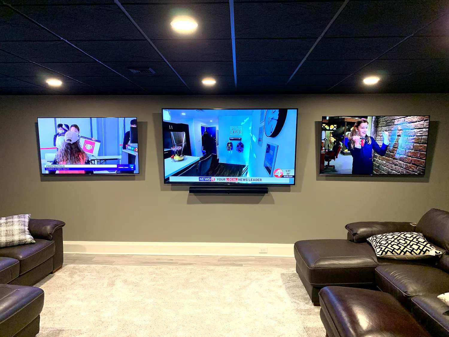 Lower-level media lounge with multiple displays